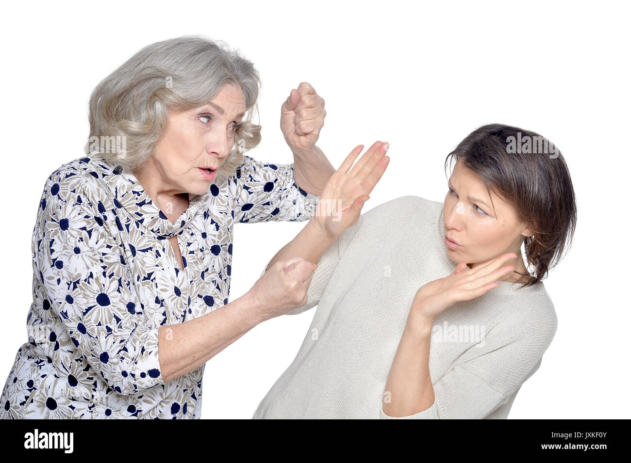 Hauts femme criant sur fille Banque D'Images