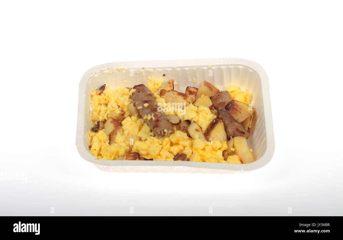 La cuisson, micro-ondes, plateau de petit-déjeuner d'Aunt Jemima d'œufs brouillés avec des saucisses et pommes de terre rôties sur fond blanc, d'isoler. USA Banque D'Images La cuisson, micro-ondes, plateau de petit-déjeuner d'Aunt Jemima d'œufs brouillés avec des saucisses et pommes de terre rôties sur fond blanc, d'isoler. USA Banque D'Images