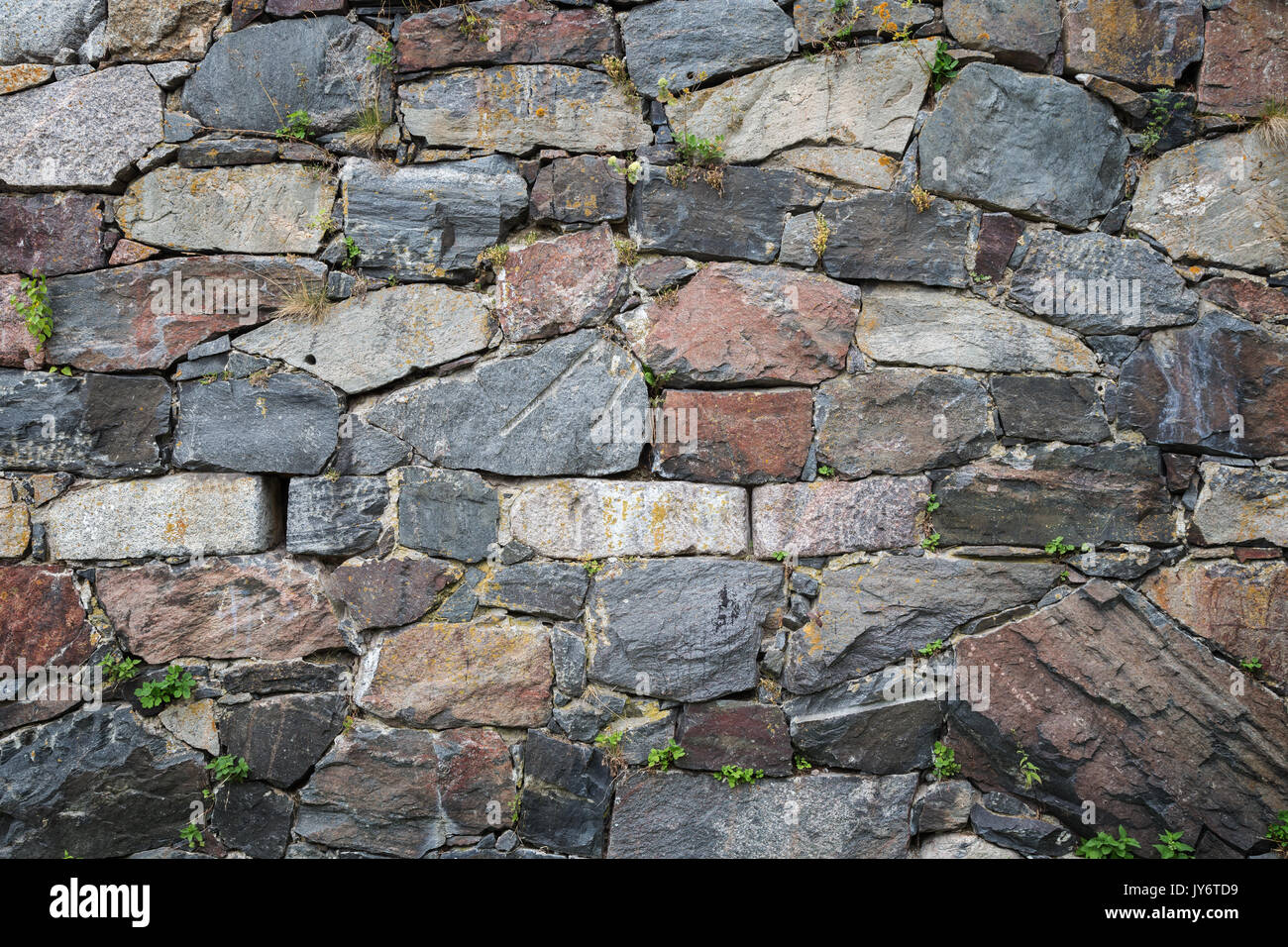 Close-up d'un vieux mur à une forteresse en pierres avec le vignetage. Banque D'Images Close-up d'un vieux mur à une forteresse en pierres avec le vignetage. Banque D'Images