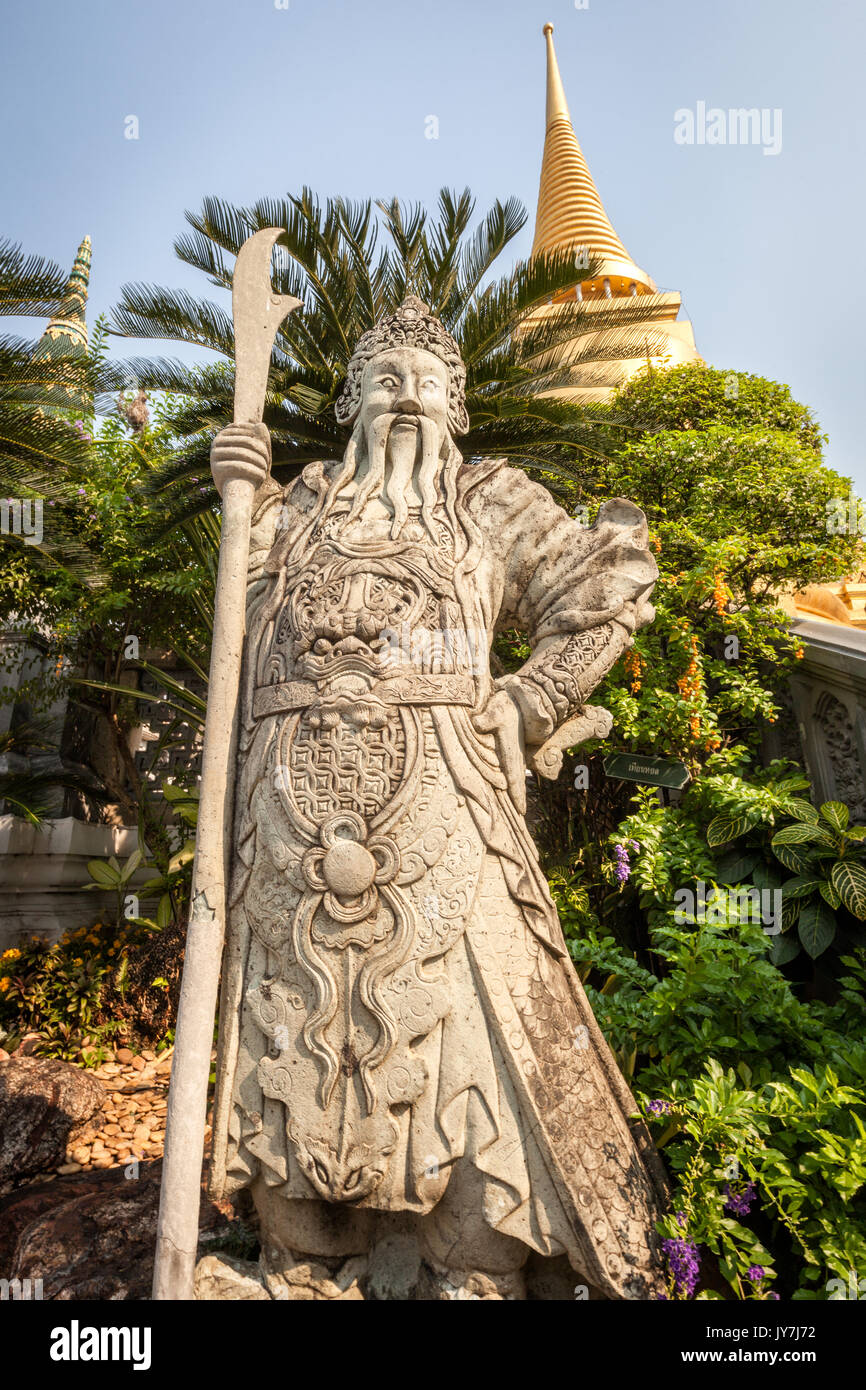 Pierre chinois statue gardienne au Wat Phra Kaew Temple du Bouddha d'Émeraude, Grand Palace, Bangkok, Thaïlande, Banque D'Images