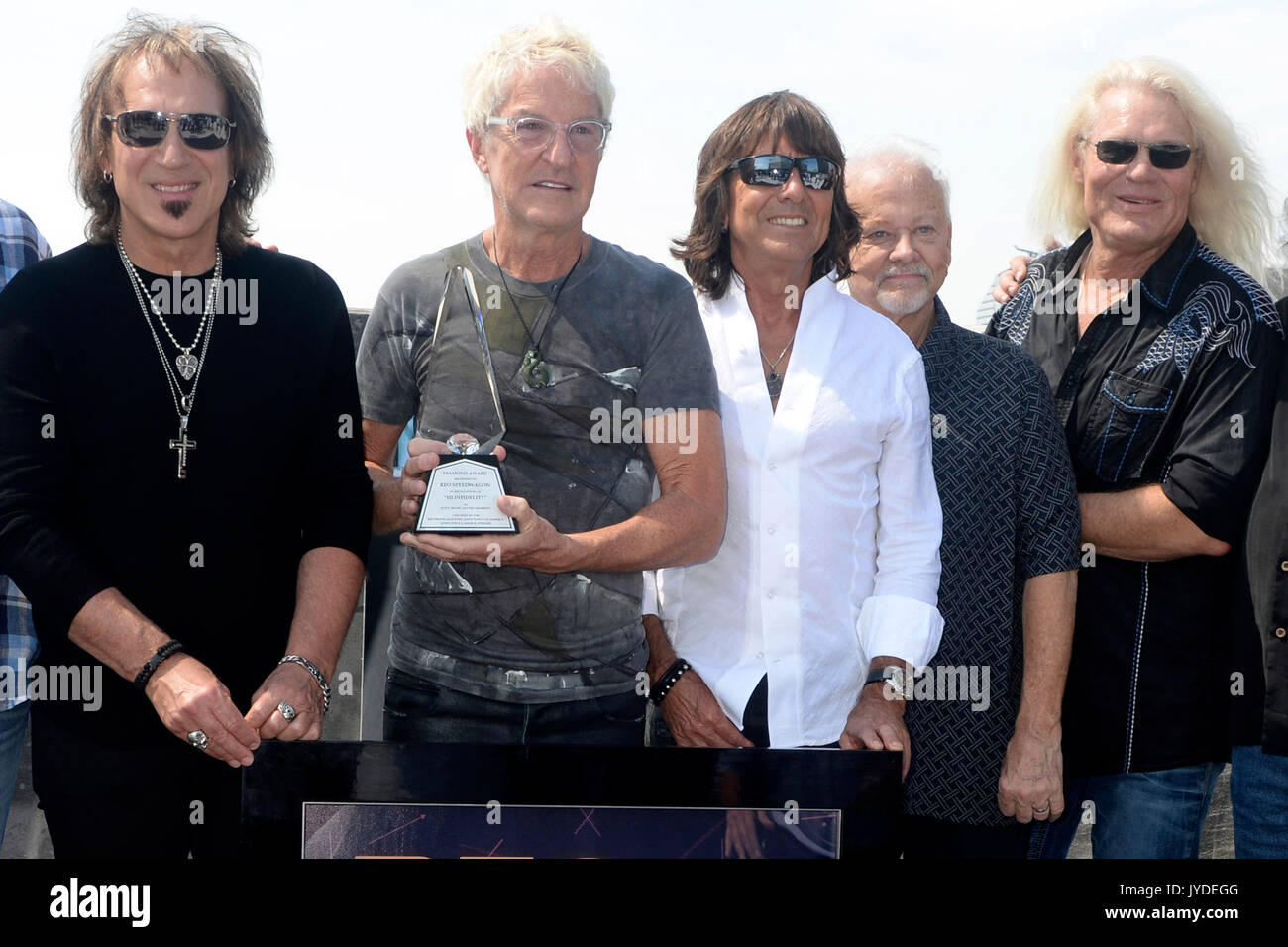 Dave Amato, Kevin Cronin, Bryan Hitt, Neal Doughty et Bruce Hall assister à REO Speedwagon reçoit RIAA Diamond Award pour 'Hi' infidélité à Sony Music le 17 août 2017 dans la ville de New York. Banque D'Images