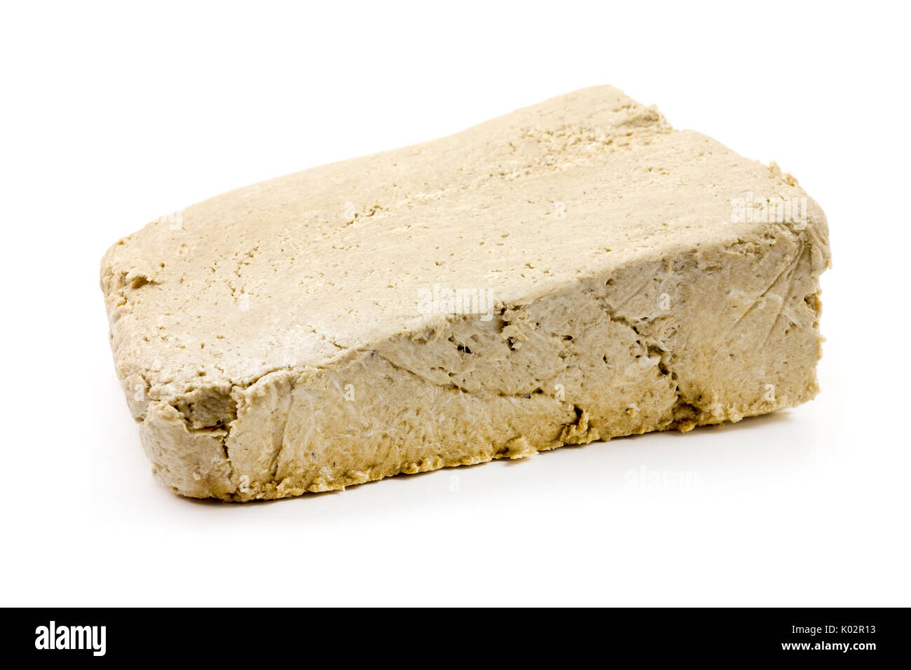 Le halva de tournesol sur fond blanc Banque D'Images