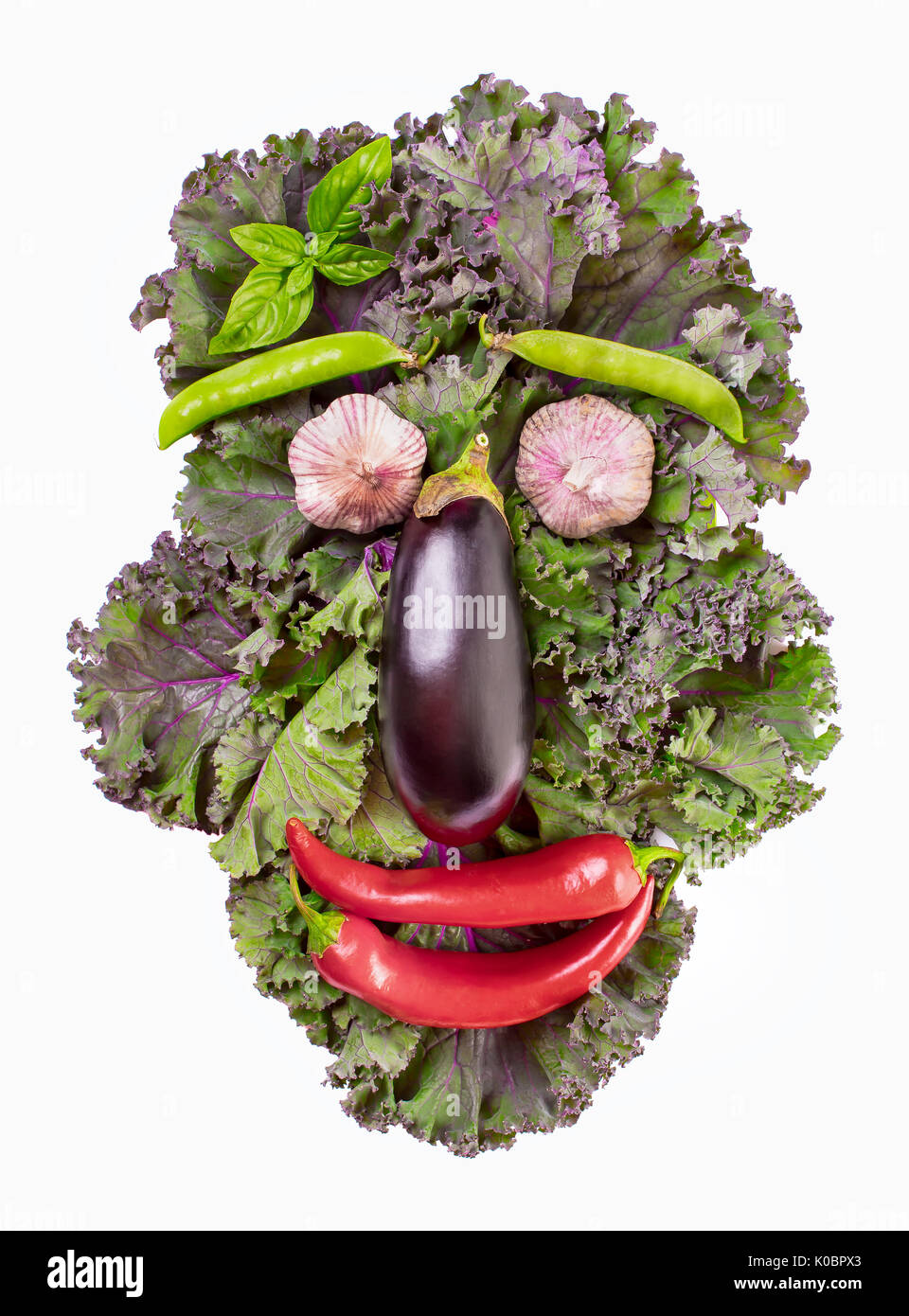Visage fait de kale et légumes isolated Banque D'Images