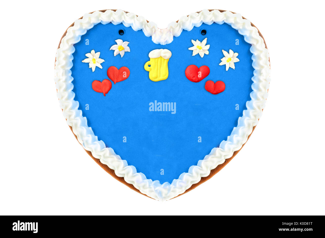 Oktoberfest gingerbread heart cake with copy space sur blanc fond isolé Banque D'Images