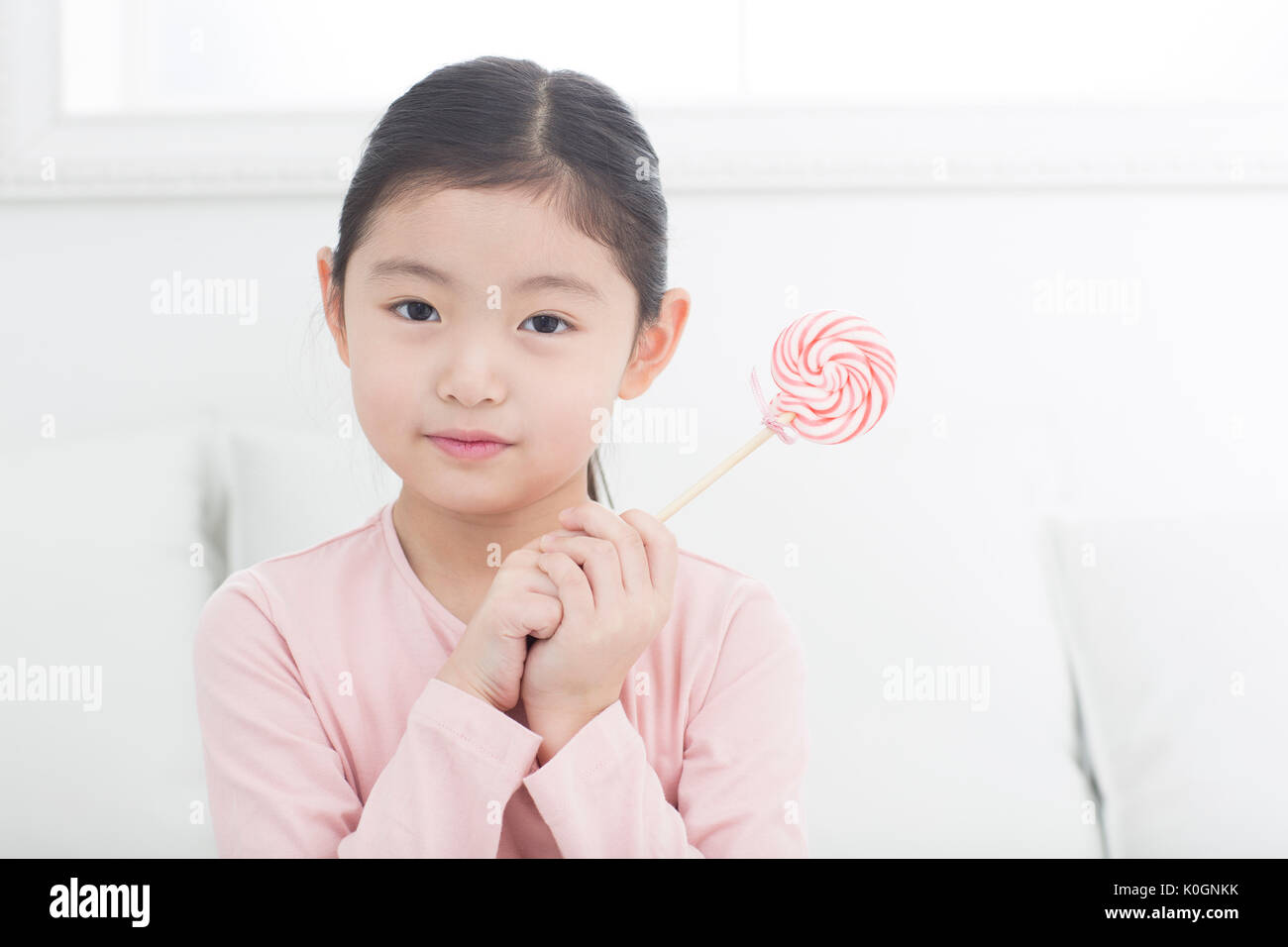Portrait of Girl with lollipop Banque D'Images