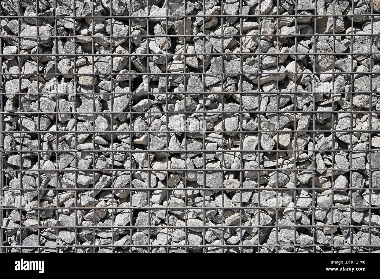 Le gravier dans la grille close-up Banque D'Images