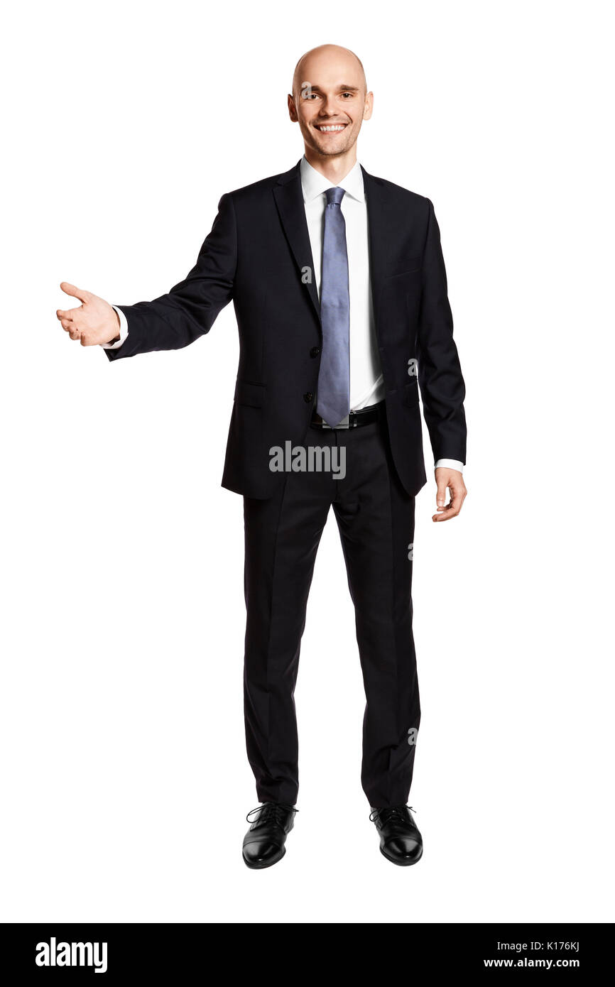 Young businessman accueille son invités. Portrait of man in suit isolé sur fond blanc. Banque D'Images
