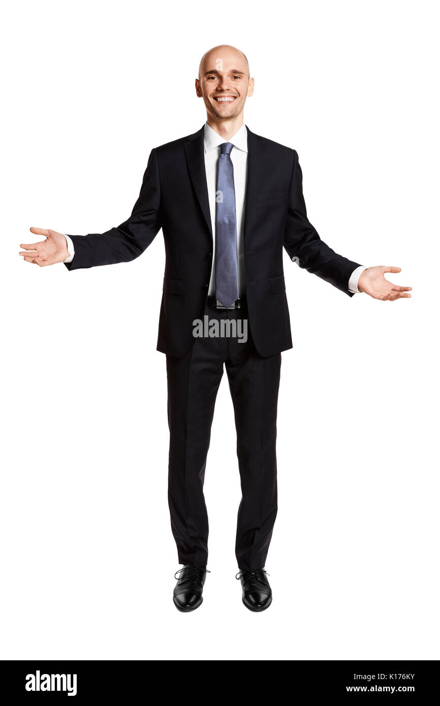 Cheerful businessman accueille ses invités. Portrait of man in suit isolé sur fond blanc. Banque D'Images
