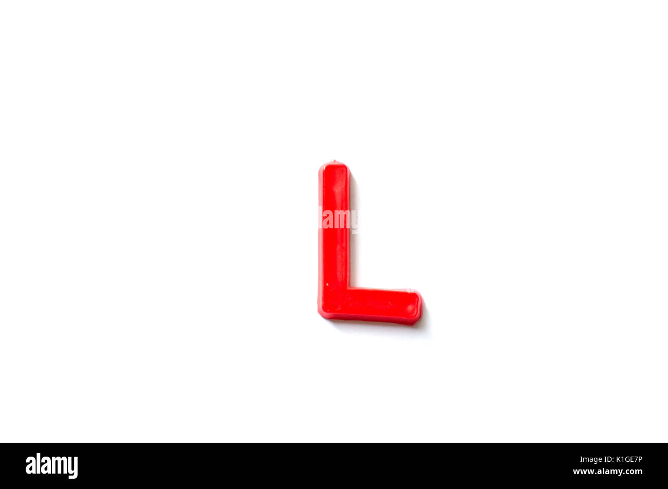Lettres en plastique isolé l arrière-plan blanc. Banque D'Images