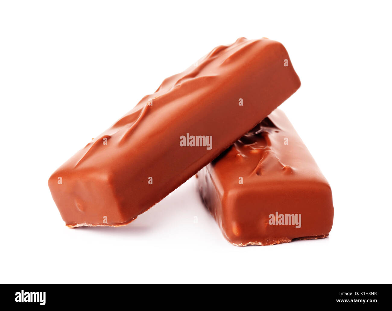 Deux barres de chocolat au caramel isolé sur fond blanc Banque D'Images