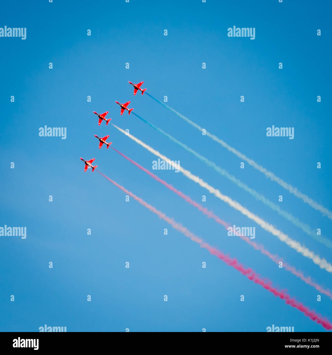 La Royal Air force de l'équipe des flèches rouges exécuter leurs avions bae hawk à leur affichage dans London, England Banque D'Images