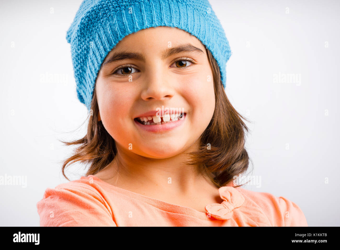 Studio Portrait of a beautiful happy girl souriant Banque D'Images