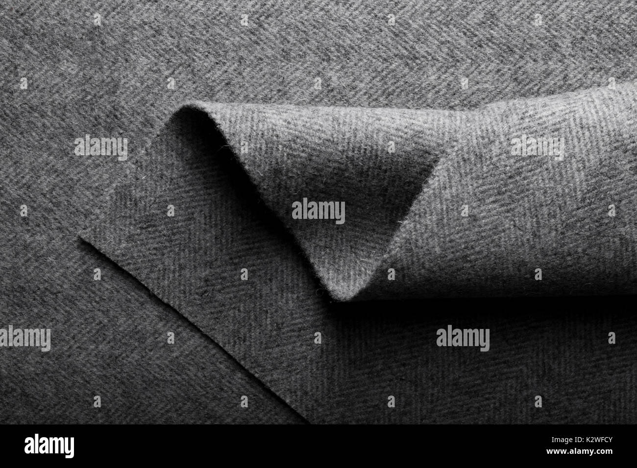 Tissu chevron gris tweed à chevrons, fond textile pour les créateurs de mode. Banque D'Images