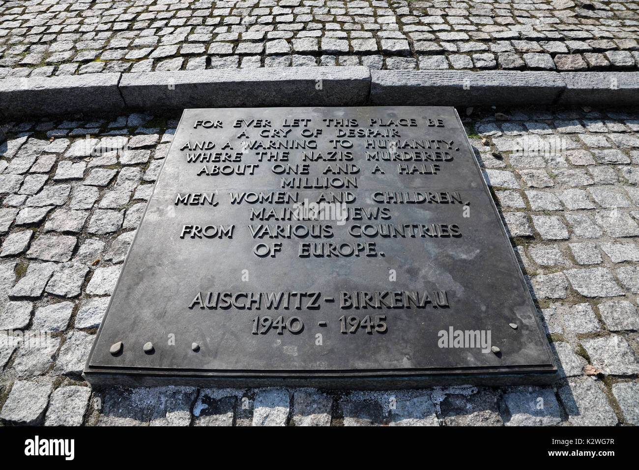 Le message sur le monument à ceux qui sont morts dans le camp de concentration nazi d'Auschwitz Birkenau, près de la ville de Łódź, Pologne, photographe Banque D'Images