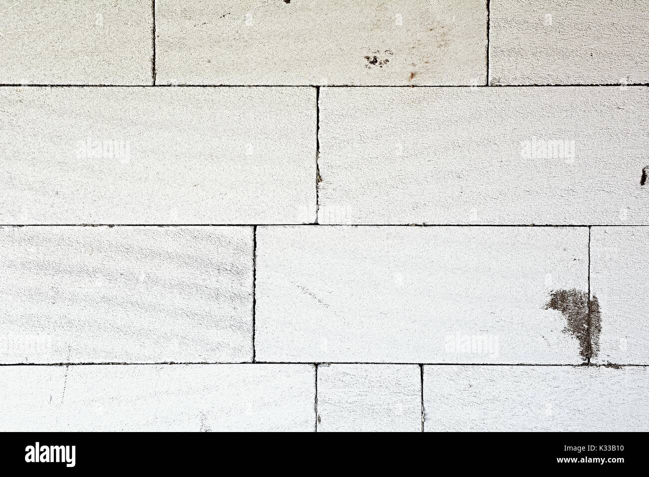 La texture d'un mur en blocs de béton cellulaire en blanc. Banque D'Images
