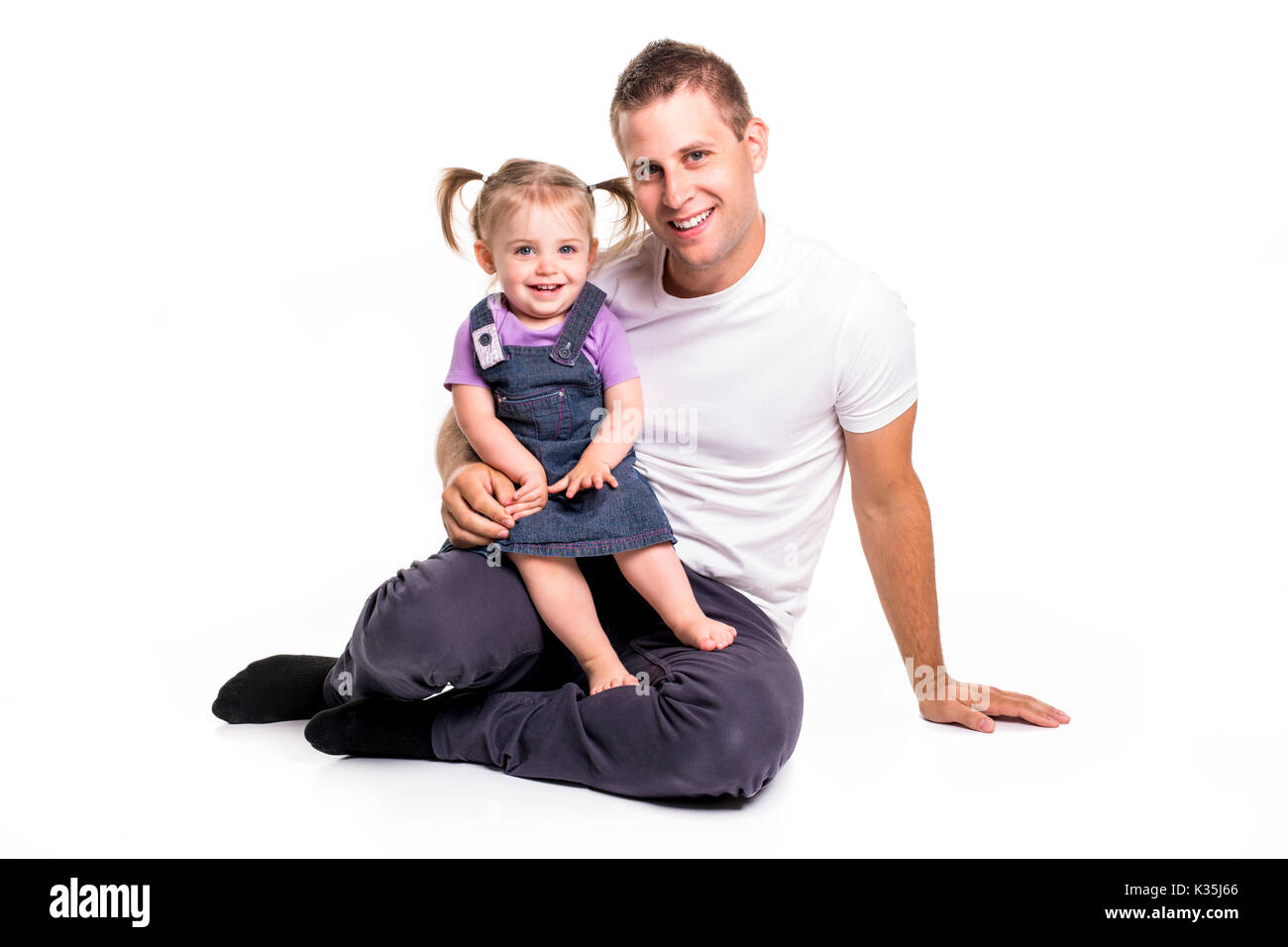 Un père et fille s'est retrouvée sur le sol s'amusant Banque D'Images