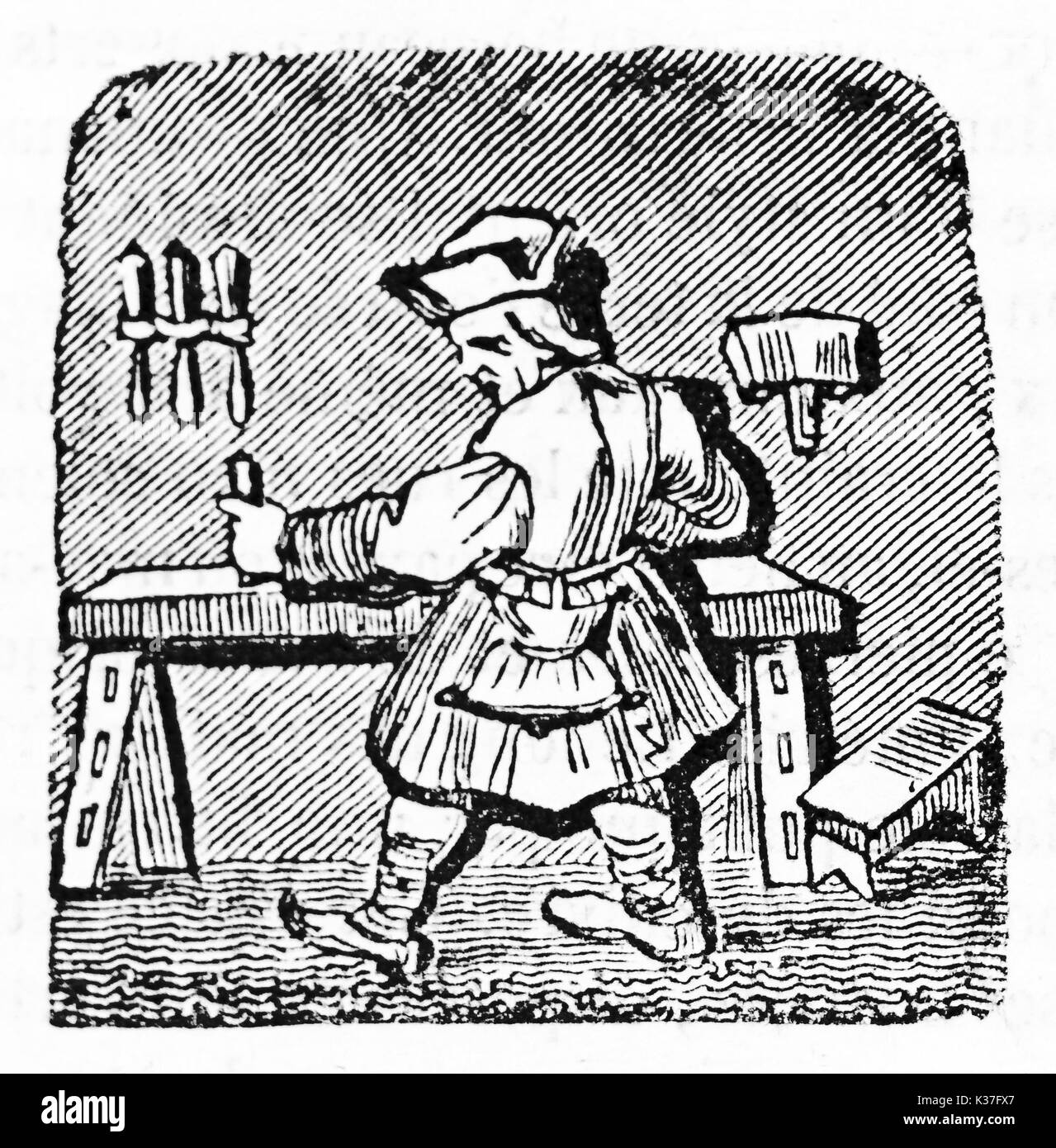 Icône médiévale d'un menuisier travaille sur son bureau avec ses outils. Après avoir détruit des misericord dans Corbeil cathédrale Saint-Spire. Publié le magasin pittoresque Paris 1834 Banque D'Images