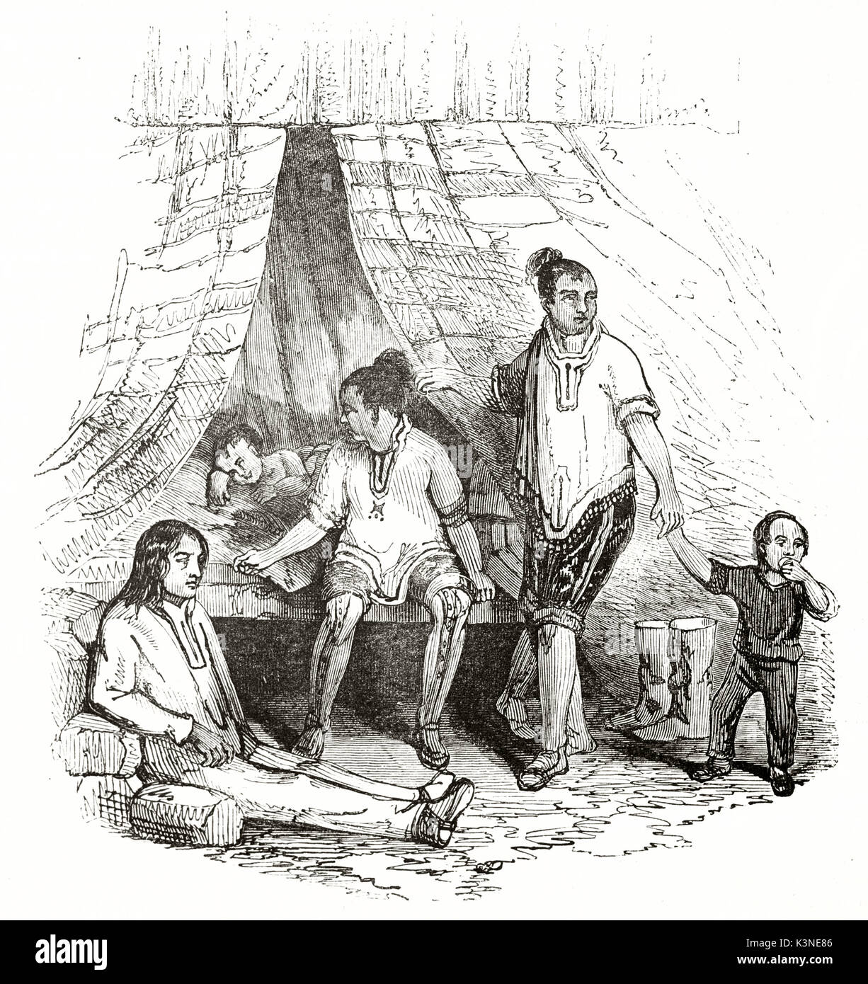 Vieille illustration d'Esquimo reposant dans la famille dans l'intérieur maison Frederickshaab au Groenland. Par auteur non identifié publié le magasin pittoresque Paris 1839 Banque D'Images
