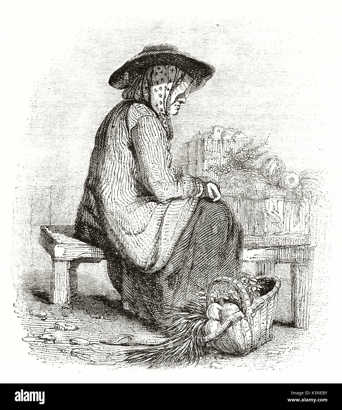 Illustration d'un vieux paysan Normand assis près d'un panier rempli de légumes en costume traditionnel. Par auteur non identifié publié le magasin pittoresque Paris 1839 Banque D'Images