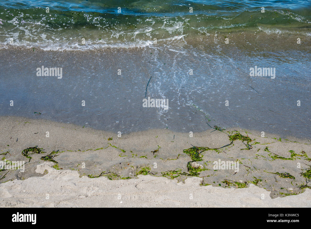 Résumé des stries Gris Vert océan vagues sable brun Banque D'Images