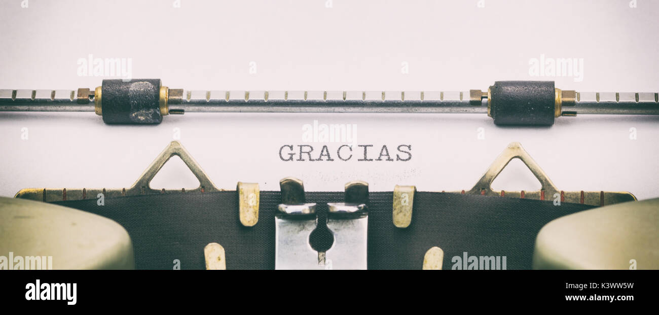 Close-up of de mot GRACIAS sur feuille d'une machine à écrire Banque D'Images