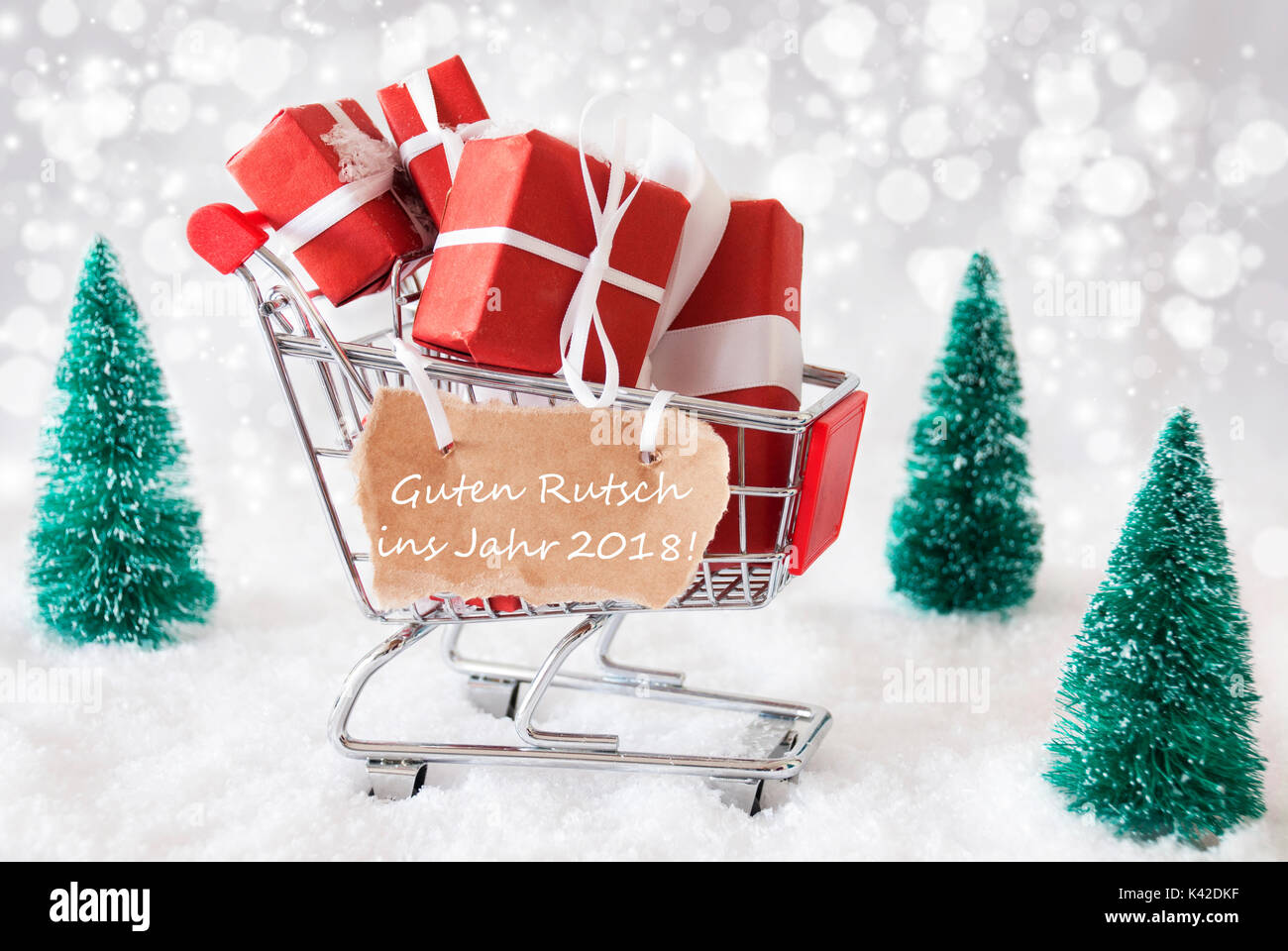 Chariot avec les cadeaux de Noël, Guten Rutsch 2018 signifie Nouvelle Année Banque D'Images