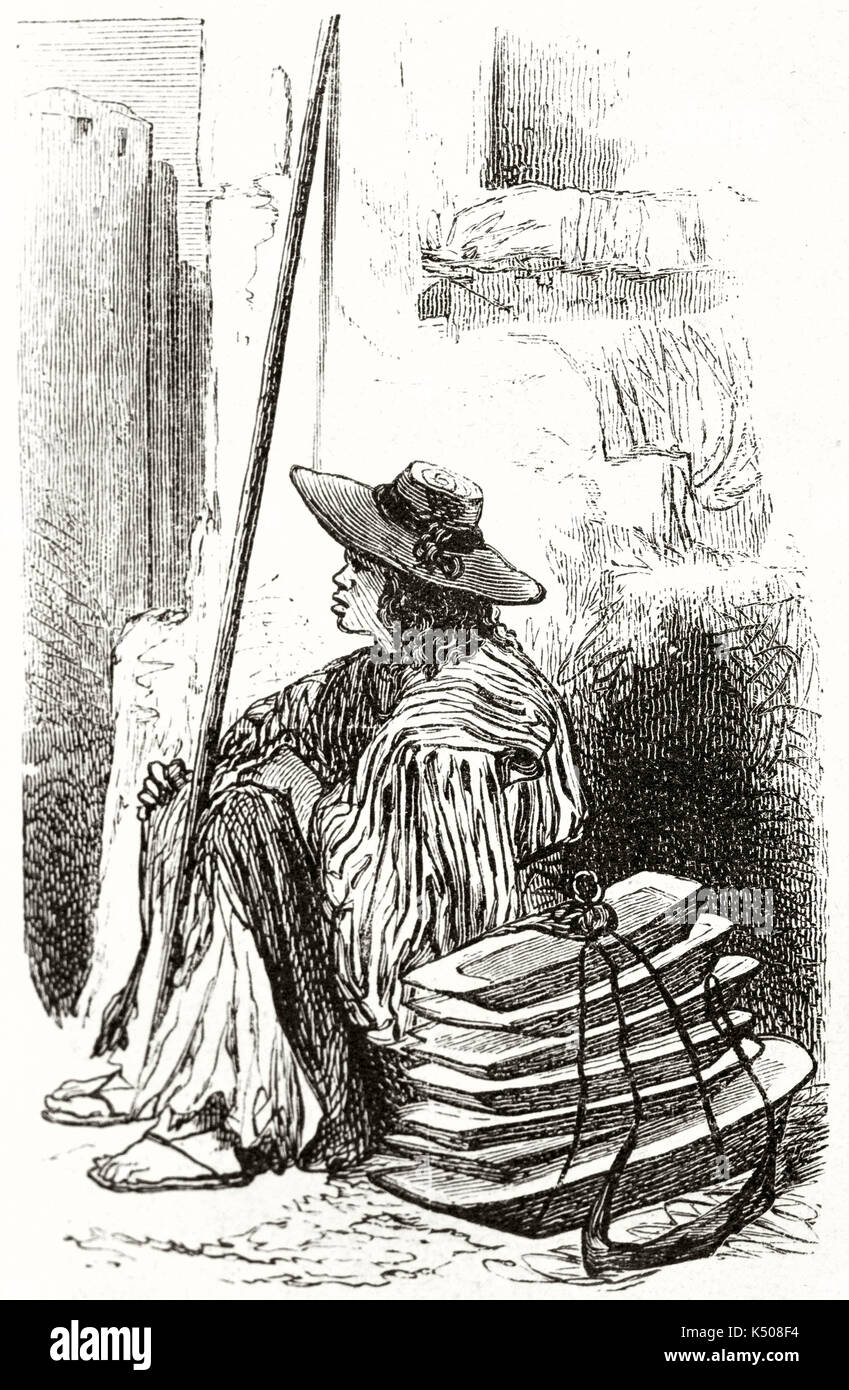 L'étain ancien colporteur habillés avec des vêtements et des sandales, simplement assis dehors, dans la ville de Mexico près d'un mur. Créé par Riou publié sur le Tour du Monde Paris 1862 Banque D'Images