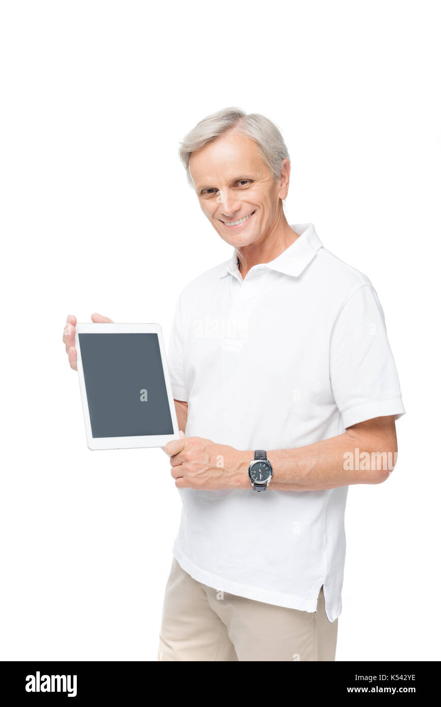 Man showing digital tablette avec écran vide, isolé sur blanc Banque D'Images
