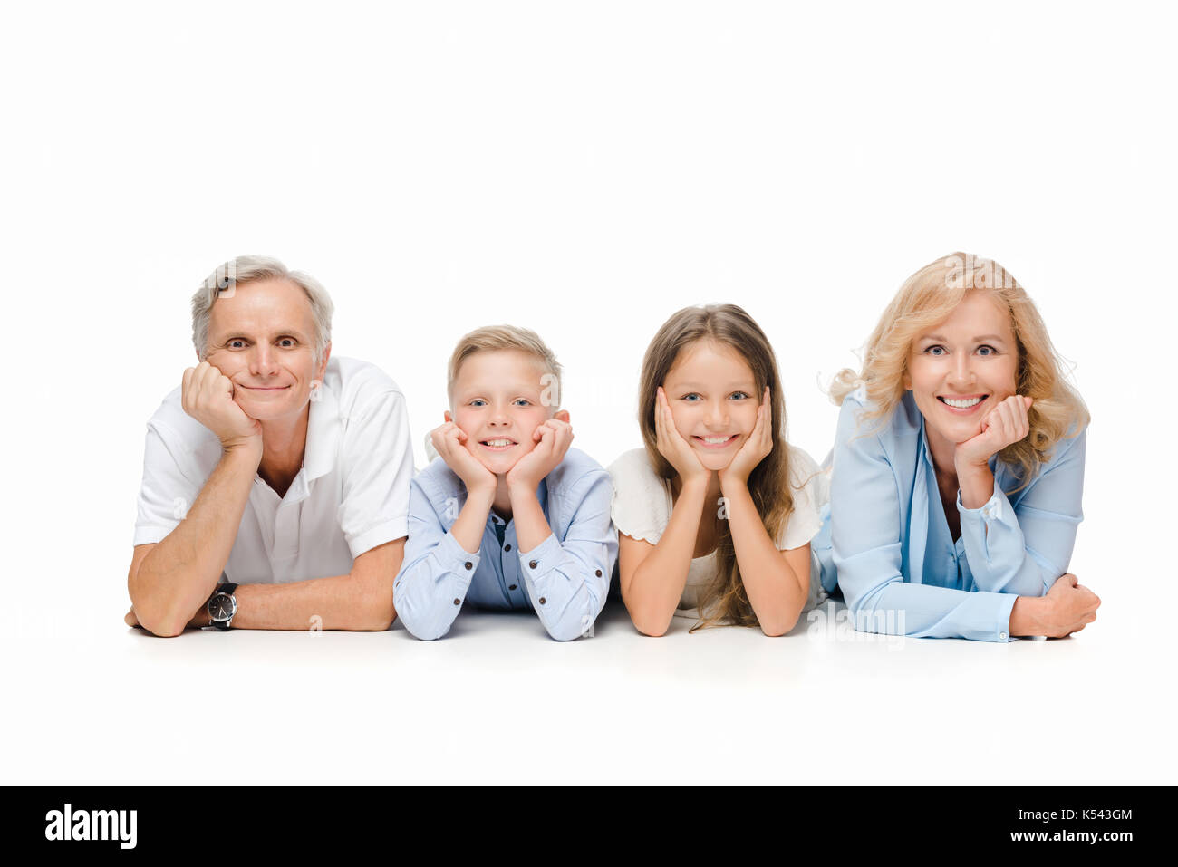 Heureux grands-parents et enfants portant sur marbre isolated on white Banque D'Images