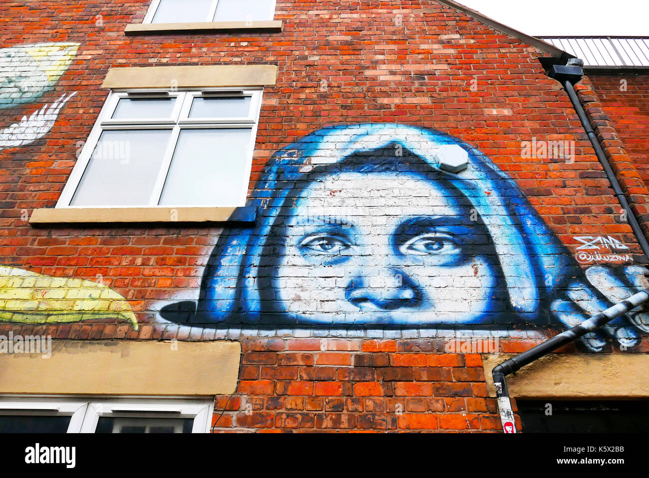 Travaux d'art de rue sur le mur Du centre d'impression et d'arts Old Rock Factory, Blackpool, Lancashire, Royaume-Uni Banque D'Images