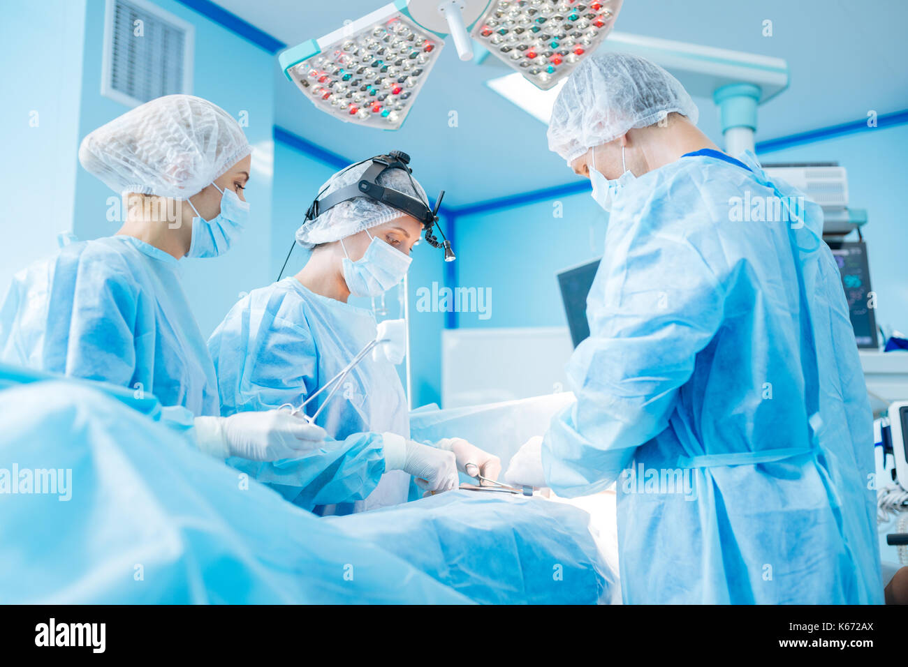 À l'écoute des travailleurs de l'exploitation de leur patient Banque D'Images