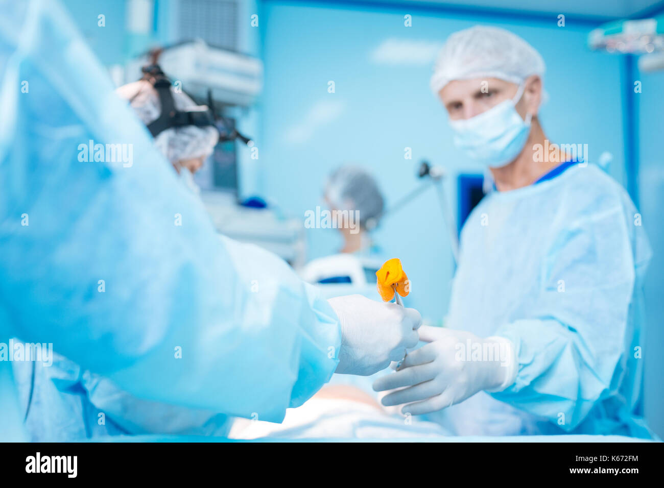 La main de l'instrument que la tenue Banque D'Images