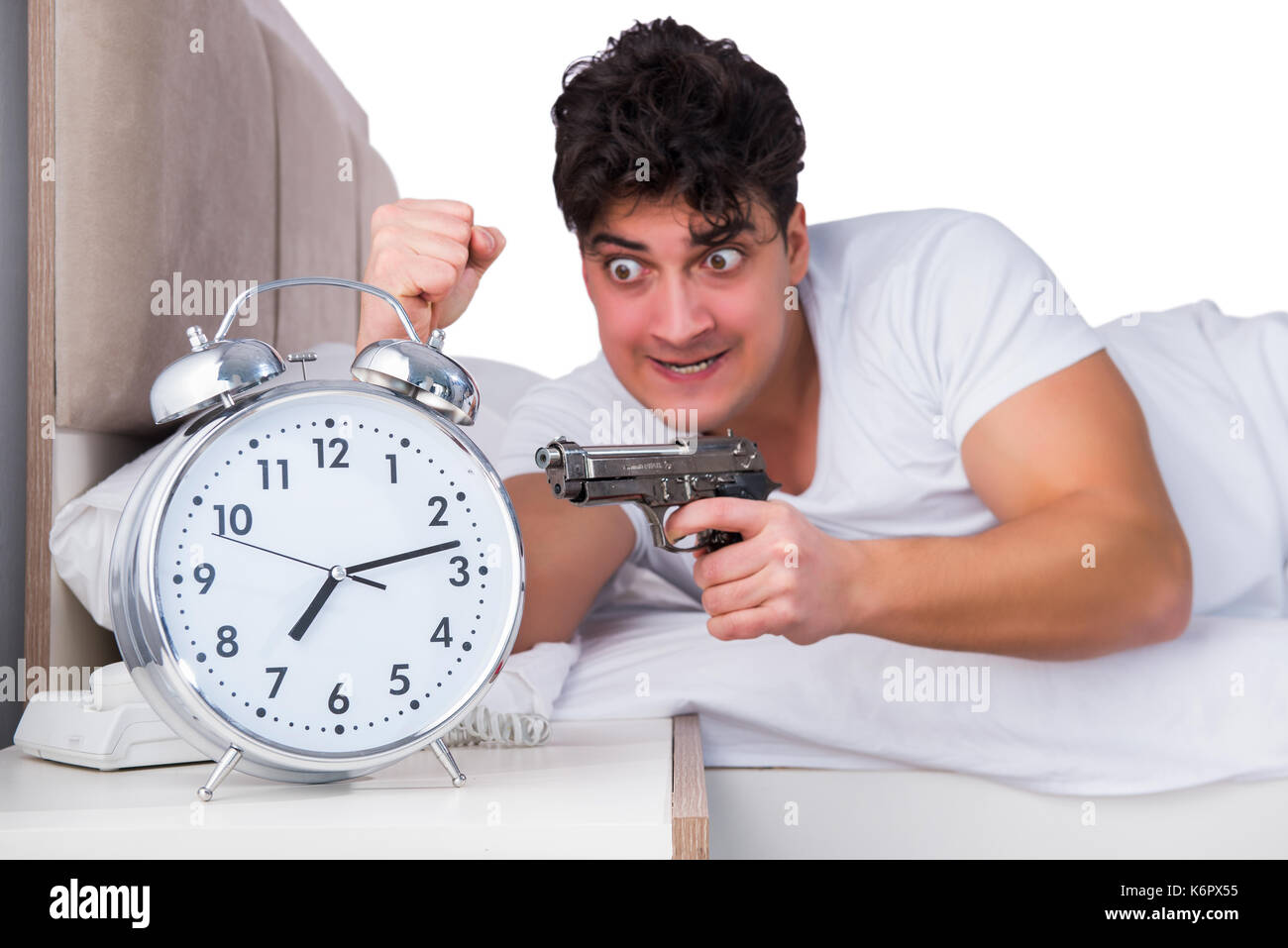 L'homme au lit souffrant de l'insomnie Banque D'Images