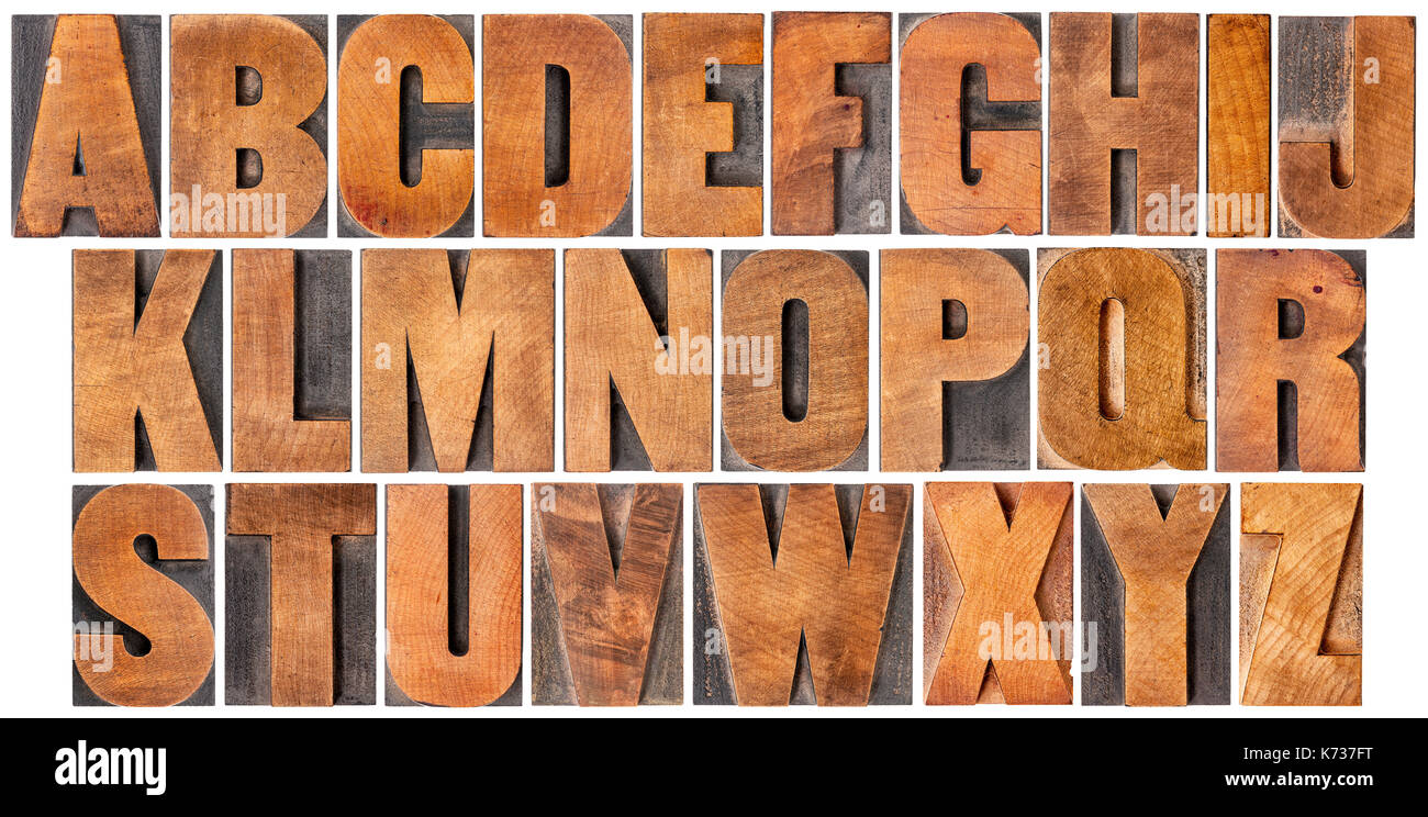 L'alphabet complet - ensemble de 26 vintage typographie isolés en bois blocs, rayé et taché par l'encre patine, quartier gothique bold extended fo Banque D'Images