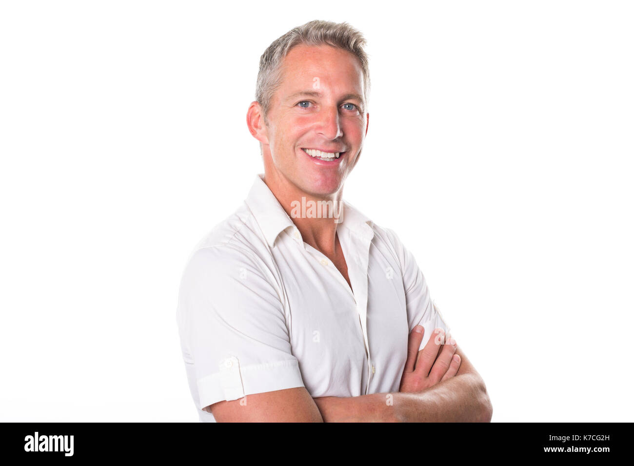 Portrait of young man standing on white background Banque D'Images