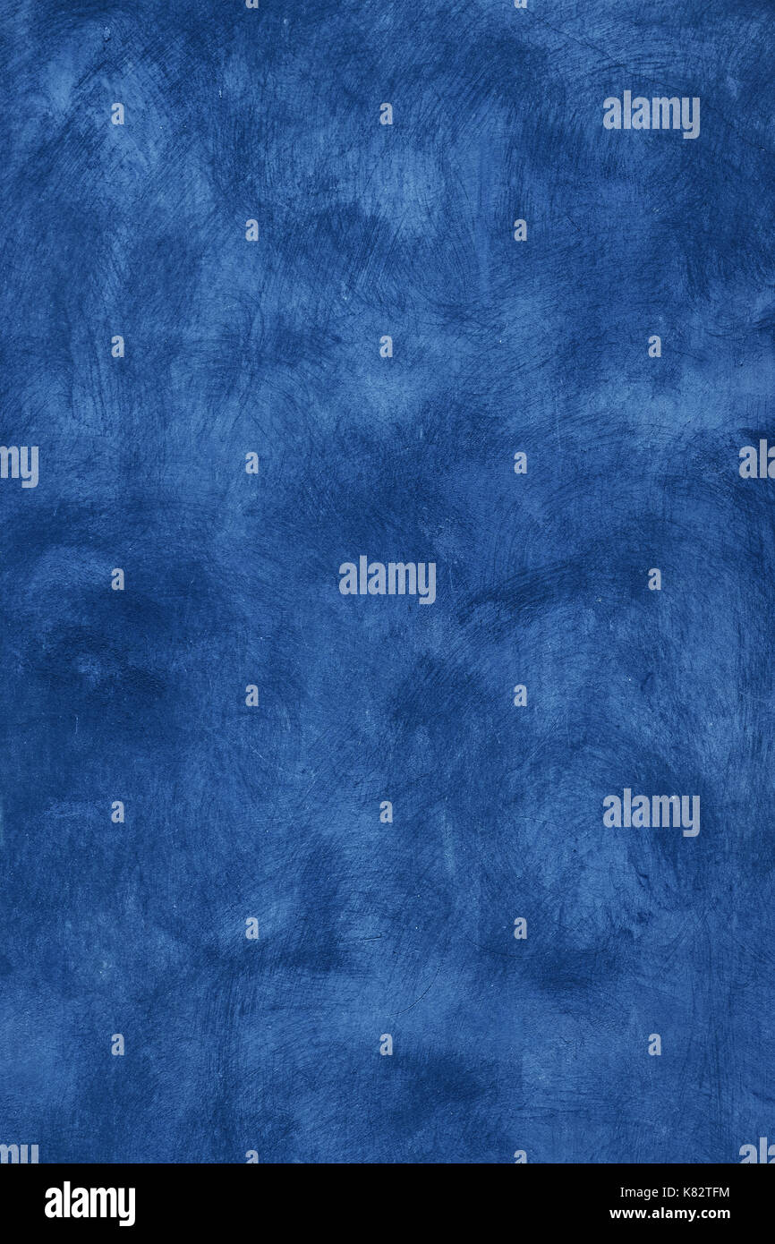 Grunge blue s'est évanoui ancienne inégale de daub mur de plâtre texture background de taches et de traits de peinture, Close up Banque D'Images