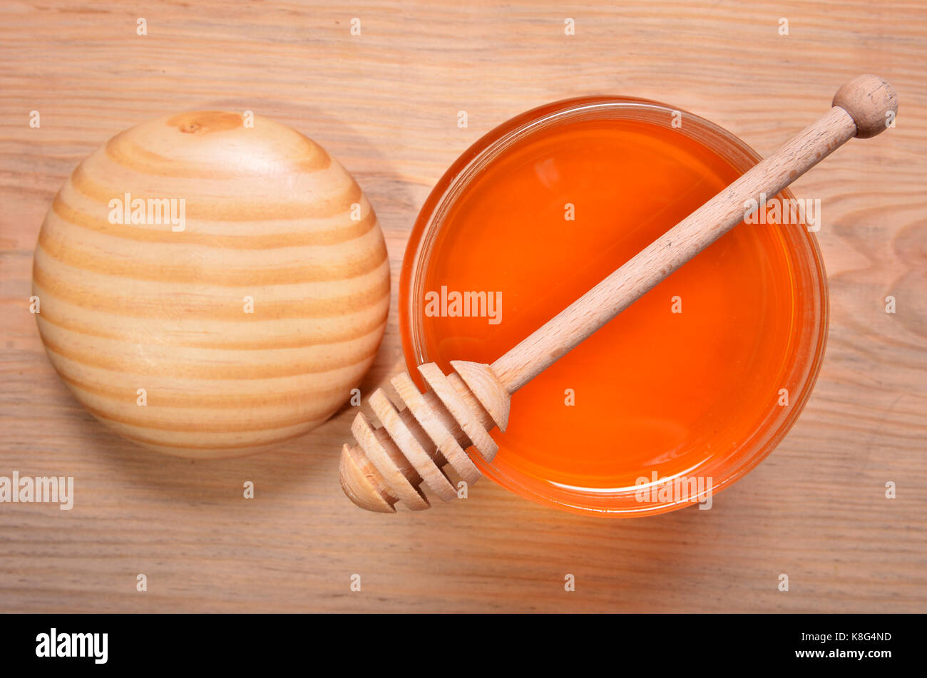 Pot de miel et stick pour le miel Banque D'Images