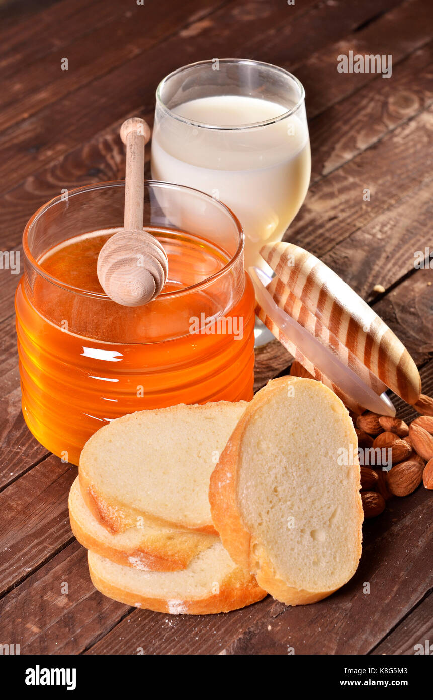 Pot de miel et stick pour le miel Banque D'Images