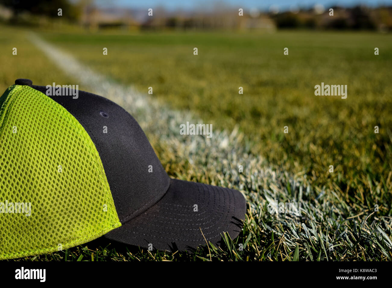 Ball Cap sur terrain de sport Banque D'Images