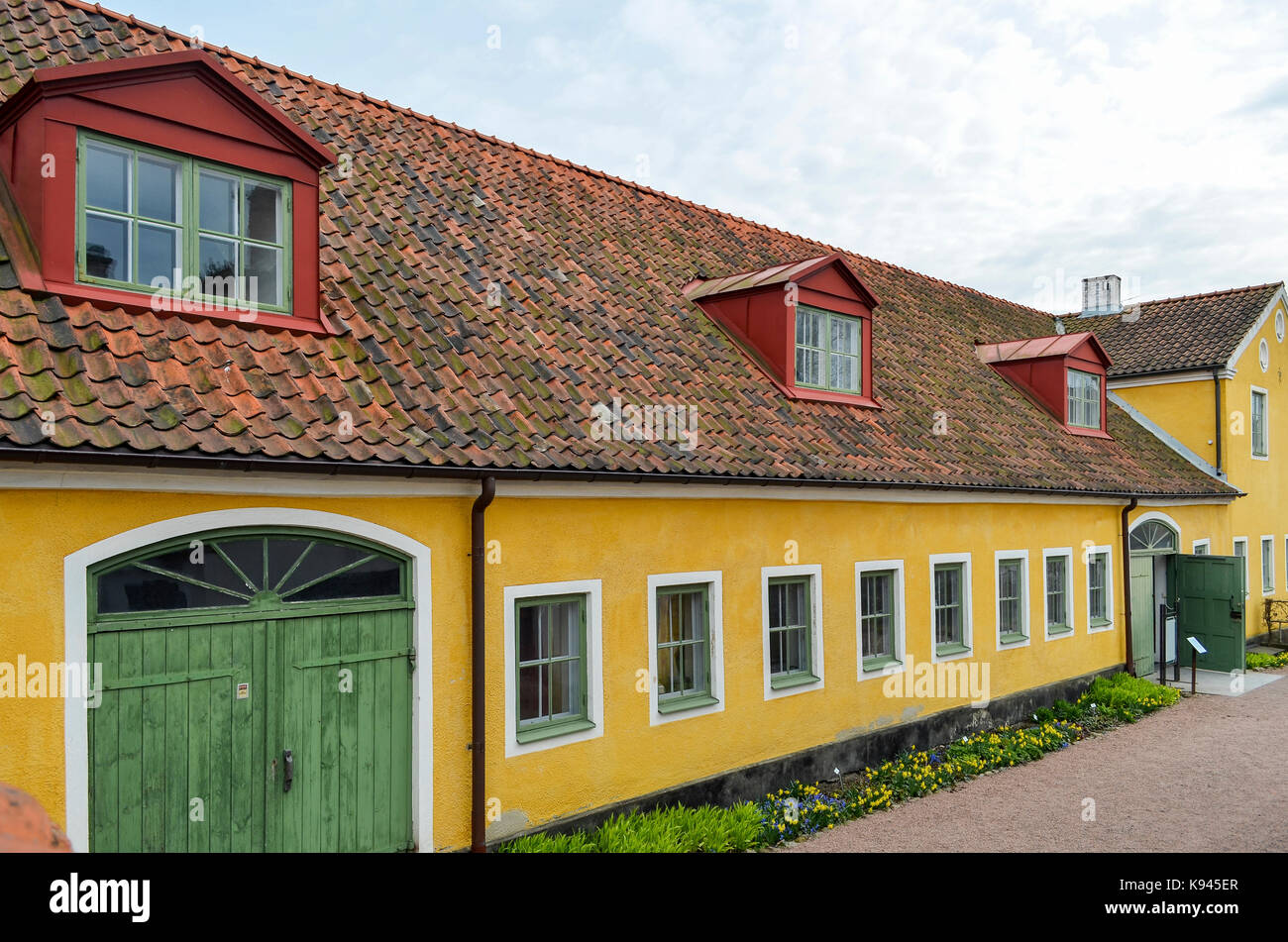 Vue extérieure de jaune, traditionnel bâtiment à un seul étage, à Copenhague, au Danemark. Banque D'Images