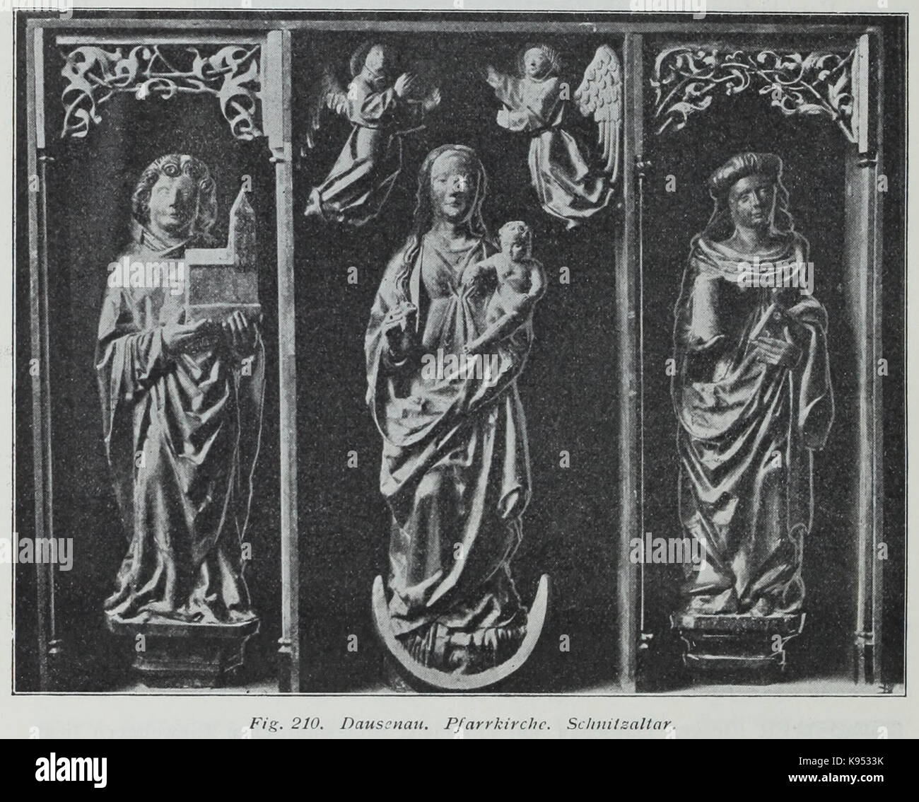 Le Luthmer III 210 représente l'autel sculpté de l'église paroissiale de Dausenau, mettant en valeur des sculptures en bois complexes issues de la tradition artistique religieuse de la région. Banque D'Images