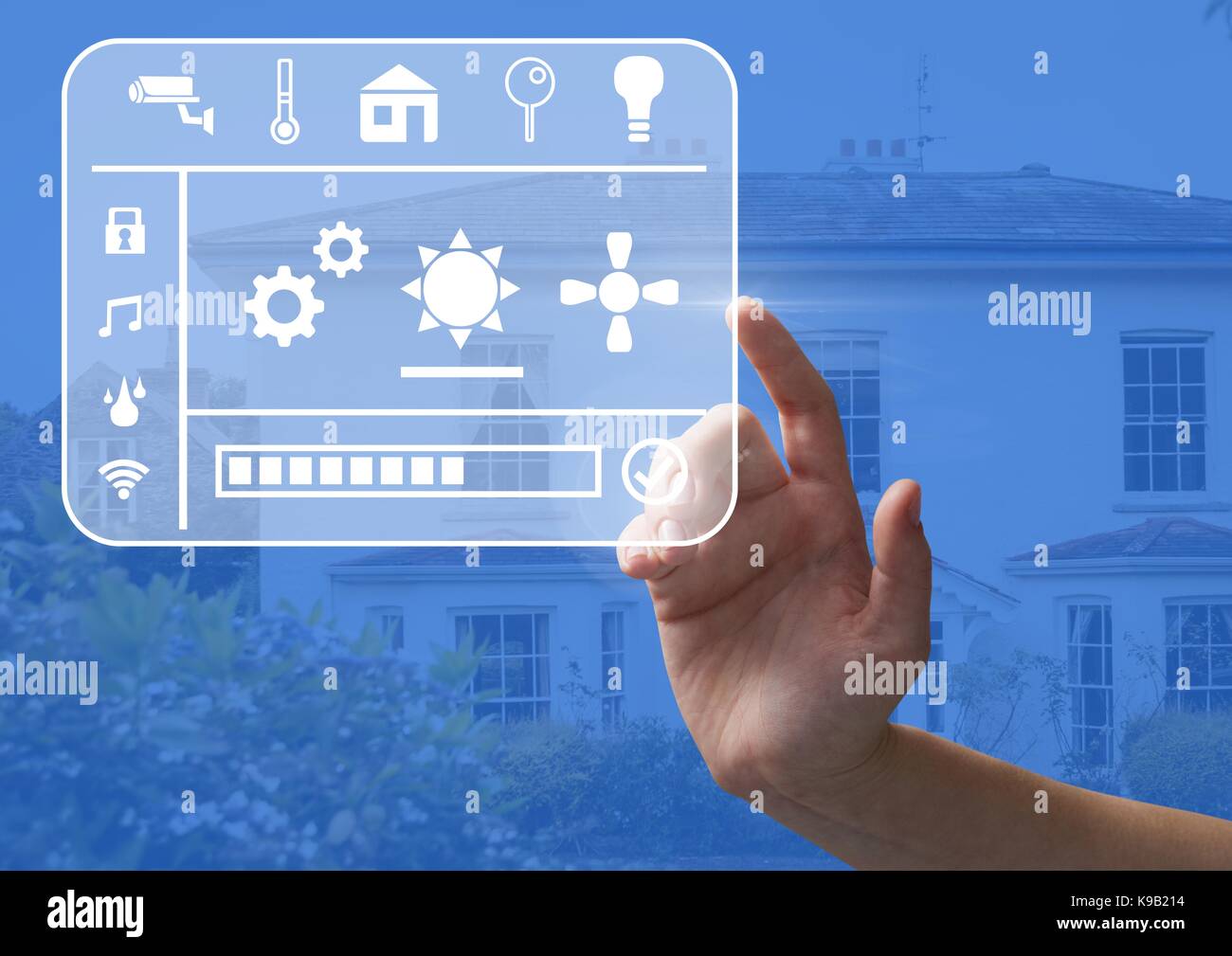 Digital composite de toucher la main de l'interface smart home à la maison Banque D'Images