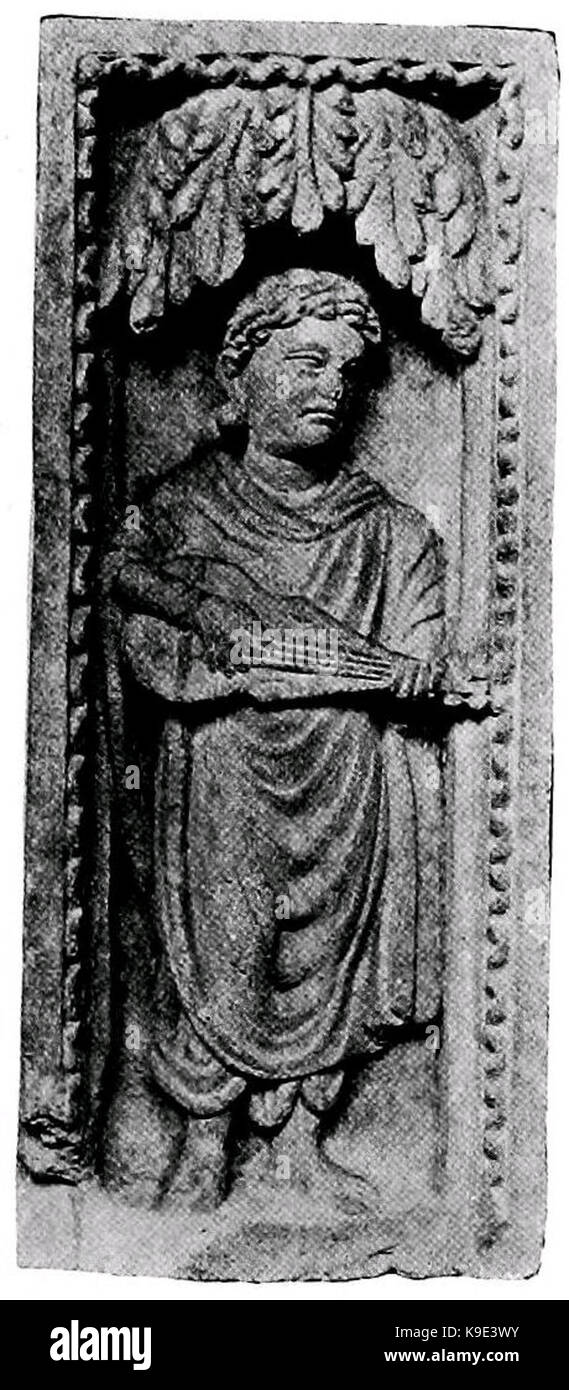 Sculpture ou image d'un homme jouant une lyre de la région de Yusufzai Gandhara, mettant en valeur l'art ancien et le patrimoine musical de la région, qui fait partie de la tradition artistique du Gandharan, qui mélange les influences hellénistique et indienne. Banque D'Images
