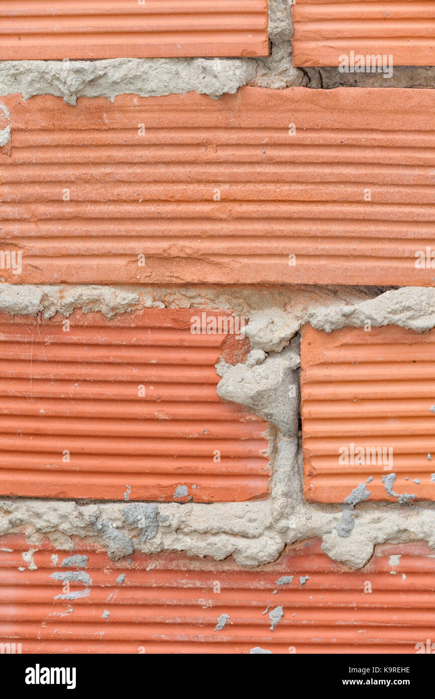 Texture mur de briques en terre cuite. Banque D'Images