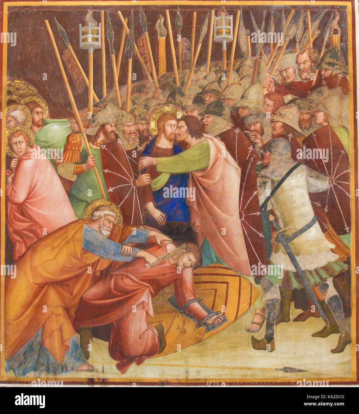 Judas trahit Jésus par un baiser. 14e siècle fresque dans l'église collégiale de san gimignano, Italie. Banque D'Images