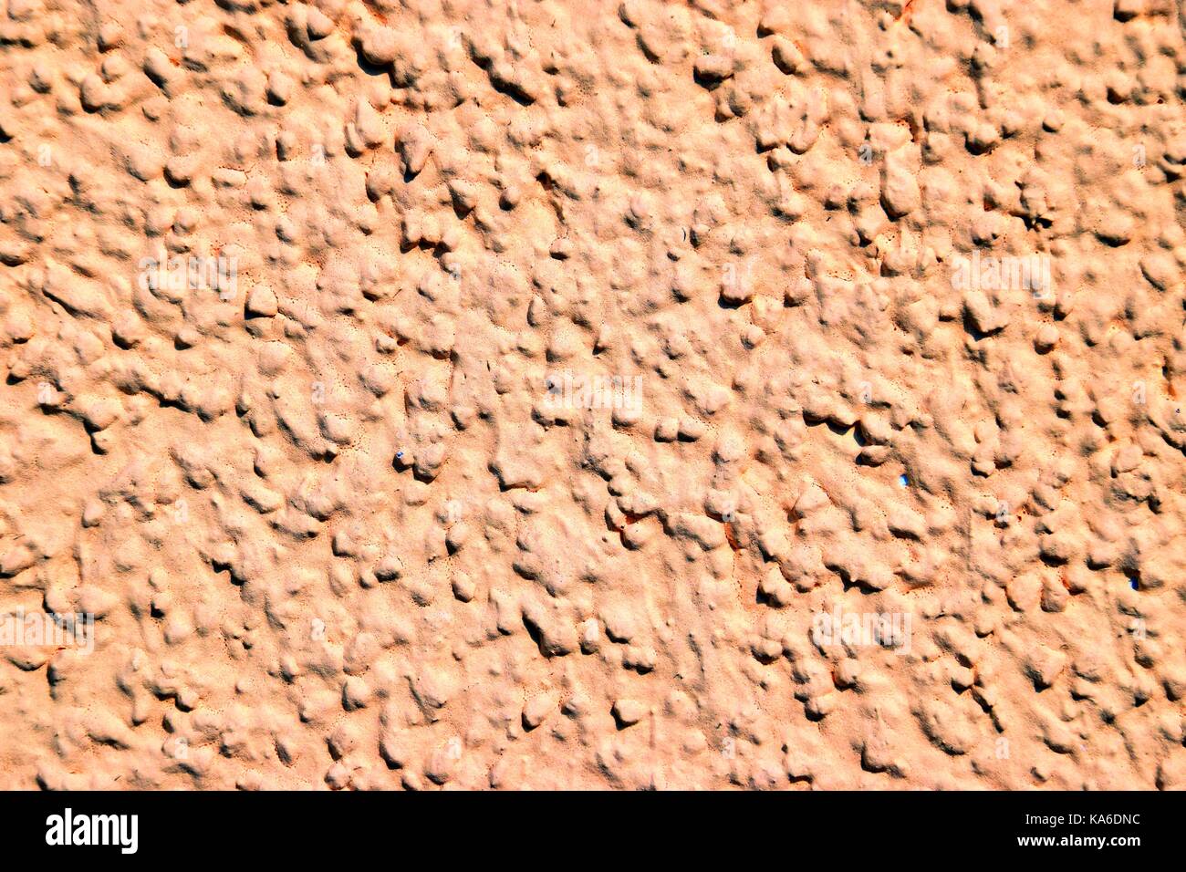 Pavés à la façade d'une maison, rugueux minéral ou terre cuite Banque D'Images