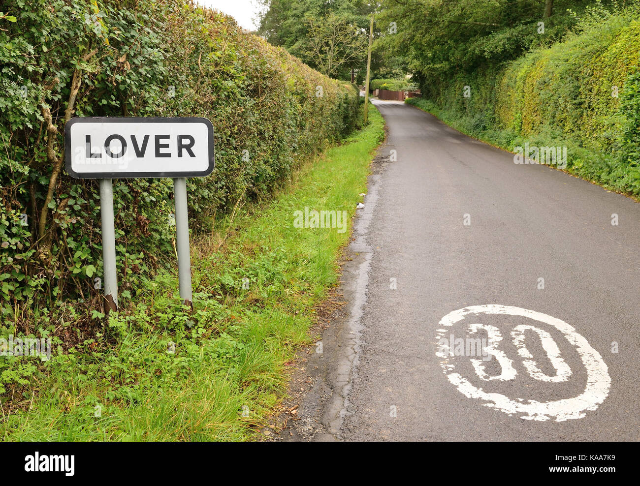 Panneau du village en amant, Wiltshire. Banque D'Images