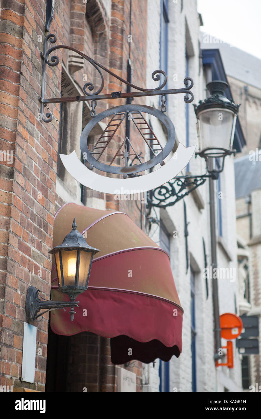 Panneau disant hôtel dans une rue de bruges Banque D'Images