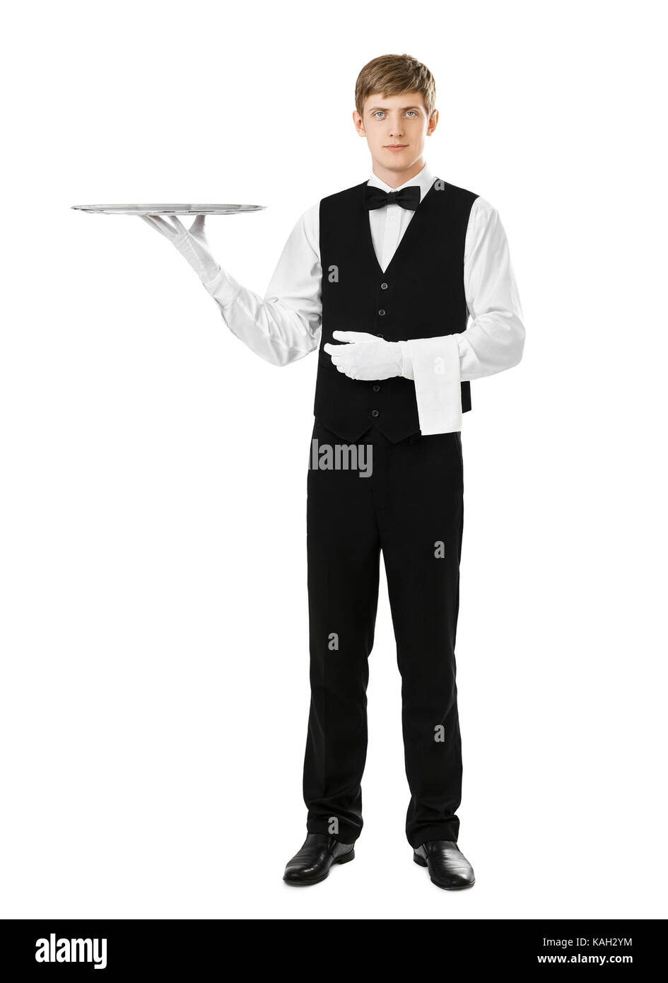 Portrait of handsome waiter holding élégant plateau d'argent vide isolé sur fond blanc Banque D'Images