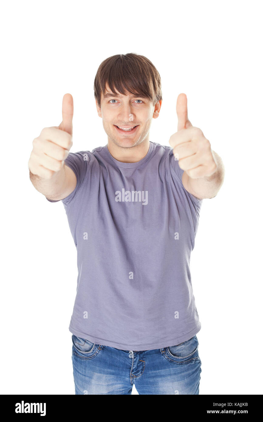 Portrait of smiling man standing with Thumbs up isolé sur fond blanc Banque D'Images
